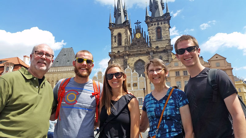 group of tourists on prague old town square