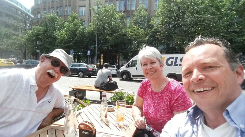 couple drinking on wenceslas square in prague